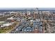 Aerial view of the community with views of the city skyline and tree-lined streets at 525 N Graham St # 3A, Charlotte, NC 28202