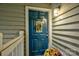 Charming unit entrance with bright blue door and decorative wreath at 525 N Graham St # 3A, Charlotte, NC 28202