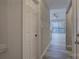 Welcoming hallway with modern gray walls and contrasting white trim at 525 N Graham St # 3A, Charlotte, NC 28202