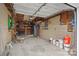 Organized garage with work space at 27 Sw Barbee Rd, Concord, NC 28027