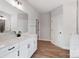 Bathroom with a vanity, mirror and doorway to another room at 4021 Grace Pointe Dr # 104, Wesley Chapel, NC 28079