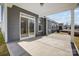 A covered patio with access to the backyard at 4021 Grace Pointe Dr # 104, Wesley Chapel, NC 28079
