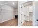 Spacious walk-in closet with wire shelving and access to laundry room at 4021 Grace Pointe Dr # 104, Wesley Chapel, NC 28079