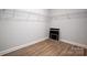 Uncluttered walk-in closet with wire shelving and ample storage space at 4021 Grace Pointe Dr # 104, Wesley Chapel, NC 28079