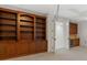 Finished basement featuring built-in bookshelves and a beverage bar, perfect for entertaining at 6040 Oxfordshire Rd, Waxhaw, NC 28173