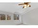 Bright bedroom featuring neutral carpeting, a ceiling fan, and a window seat overlooking the outdoors at 6040 Oxfordshire Rd, Waxhaw, NC 28173