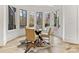 Bright breakfast nook with large windows and a view of the backyard at 6040 Oxfordshire Rd, Waxhaw, NC 28173