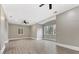 Spacious living room with hardwood floors, recessed lighting, ceiling fans, and plenty of natural light at 6040 Oxfordshire Rd, Waxhaw, NC 28173