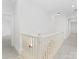 Stairway with white railings and carpeted steps at 6040 Oxfordshire Rd, Waxhaw, NC 28173