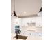 Modern kitchen featuring white cabinets, stainless steel appliances, and tiled backsplash at 7928 Cedarsmith Ct, Charlotte, NC 28217