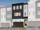 Modern three-story townhome with dark brown garage door at 7940 Cedarsmith Ct, Charlotte, NC 28217