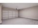 Spacious garage with automatic garage door and ample storage at 7940 Cedarsmith Ct, Charlotte, NC 28217