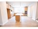 Open kitchen with hardwood floors, lots of counter space, and stainless appliances at 7940 Cedarsmith Ct, Charlotte, NC 28217