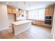 Modern kitchen with stainless steel appliances and a large center island at 7940 Cedarsmith Ct, Charlotte, NC 28217