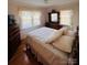 Comfortable bedroom with hardwood floors and a dresser at 150 Wilson St, Chester, SC 29706