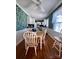 Bright dining area with hardwood floors and a charming table set at 150 Wilson St, Chester, SC 29706