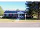 Brick ranch home with a well-maintained lawn and walkway at 150 Wilson St, Chester, SC 29706