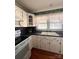 Classic kitchen featuring white cabinets and a double sink at 150 Wilson St, Chester, SC 29706