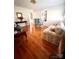 Living room with hardwood floors, built-in shelving and sofas at 150 Wilson St, Chester, SC 29706