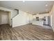 Spacious living area showcasing an open floor plan, hardwood floors, and a seamless transition to the kitchen at 849 Blue Canyon Dr, York, SC 29745
