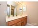 Bathroom with a large mirror, and a neutral countertop at 9618 Belloak Ln, Waxhaw, NC 28173