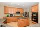 Well-equipped kitchen features modern appliances, ample storage, and an island at 9618 Belloak Ln, Waxhaw, NC 28173