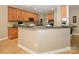 Kitchen area with counterspace, cabinetry, and eat-in bar at 9618 Belloak Ln, Waxhaw, NC 28173