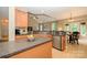 Well-lit kitchen with stainless appliances and open access to dining area at 9618 Belloak Ln, Waxhaw, NC 28173