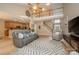 Open-concept living space with hardwood floors and staircase visible at 9618 Belloak Ln, Waxhaw, NC 28173