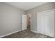 Bright bedroom featuring a double closet and a doorway to the bathroom at 1105 Kenly St, Salisbury, NC 28144