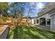 Landscaped backyard with a wooden fence and patio at 1320 Brook Rd, Charlotte, NC 28205