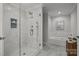Spa-like bathroom with a walk-in shower and soaking tub at 1320 Brook Rd, Charlotte, NC 28205