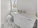 Clean bathroom, featuring a white vanity and marble-look floor at 1320 Brook Rd, Charlotte, NC 28205