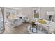 Bright bedroom with hardwood floors and access to a back patio at 1320 Brook Rd, Charlotte, NC 28205