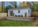 Detached garage with a spacious interior and landscaped surroundings at 1320 Brook Rd, Charlotte, NC 28205