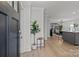 Bright and airy entryway with hardwood floors and a view of the kitchen at 1320 Brook Rd, Charlotte, NC 28205