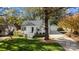 White house with gray roof and landscaped yard at 1320 Brook Rd, Charlotte, NC 28205