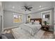 Relaxing main bedroom with a comfortable bed and wood floors at 1320 Brook Rd, Charlotte, NC 28205