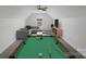 Entertainment area with sectional, television, and billiard table at 220 W Lawyers Rd, Monroe, NC 28110