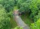 Aerial view of home with large backyard and wooded surroundings at 2109 Rock Springs Cir, Denver, NC 28037