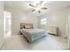 This is a carpeted bedroom featuring a ceiling fan at 2109 Rock Springs Cir, Denver, NC 28037
