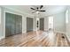 This is a bedroom featuring two closets and hardwood floors at 2109 Rock Springs Cir, Denver, NC 28037