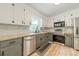 Updated kitchen featuring stainless steel appliances and bright, modern finishes at 2109 Rock Springs Cir, Denver, NC 28037