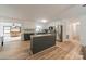 Modern kitchen with white cabinets, stainless steel appliances, and center island at 2109 Rock Springs Cir, Denver, NC 28037