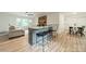 Open floorplan showcasing kitchen island and fireplace in the living room at 2109 Rock Springs Cir, Denver, NC 28037