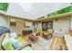 Inviting deck with seating area, perfect for outdoor relaxation and entertaining with beautiful wooded view at 2109 Rock Springs Cir, Denver, NC 28037