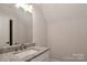 Bathroom features a granite countertop vanity and modern fixtures at 4265 Candlewood Dr, Sherrills Ford, NC 28673