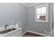 Laundry room with modern sink, and connections for modern washer/dryer combo unit at 4265 Candlewood Dr, Sherrills Ford, NC 28673
