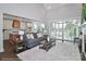 Open concept living room with access to covered porch and view of kitchen at 4265 Candlewood Dr, Sherrills Ford, NC 28673