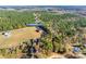 Aerial view of a house on a large lot with surrounding trees at 636 Edwards Rd, Fort Lawn, SC 29714